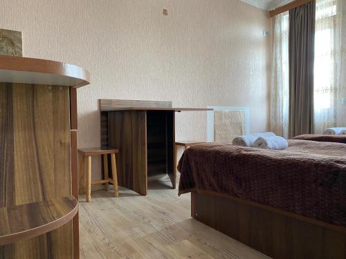 Postel nebo postele na pokoji v ubytování Sweet House In Rabati