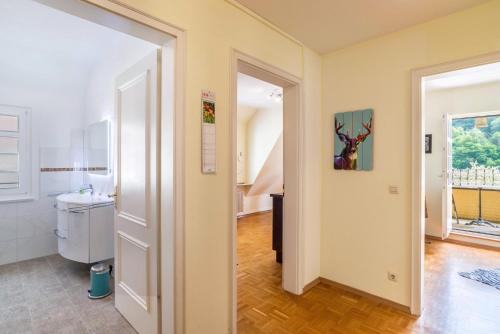 an open hallway with a bathroom and a toilet at Ferienwohnung Saline in Bad Wildbad