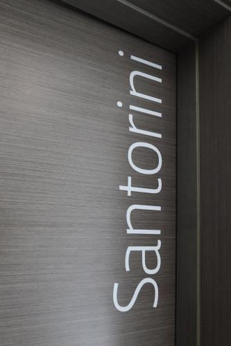 a close up of a sign on a metal door at Le Petit Boutique Hotel in Santander