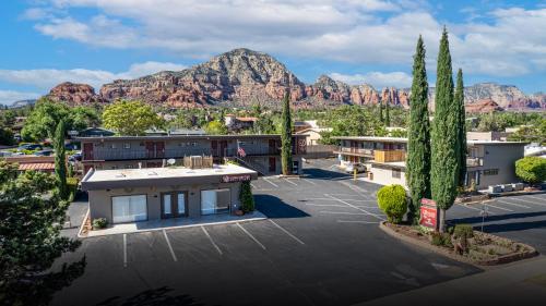 a parking lot with a mountain in the background at Dreamcatcher Inn of Sedona in Sedona