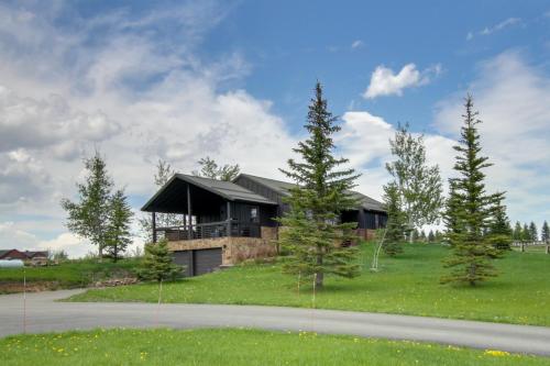 a house on the side of a road at Stunning Gallatin Gateway Mountain Retreat! in Gallatin Gateway