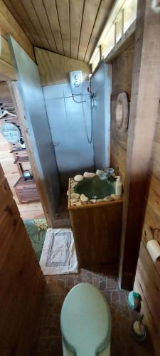 an overhead view of a bathroom with a shower and a toilet at Bon Mange Organic Farm in Vieux Fort