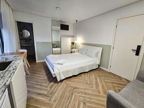 Postel nebo postele na pokoji v ubytování CUSTÓDIO SEA HOME