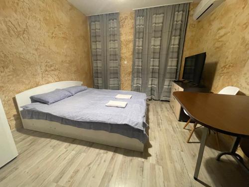 A bed or beds in a room at Colonel apartment 956