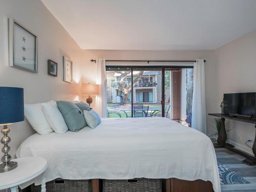 Voodi või voodid majutusasutuse 162 High Hammock Villa toas