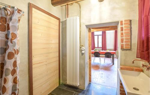 a bathroom with a shower and a tub in a room at Awesome Apartment In Monselice With Wifi And 2 Bedrooms 