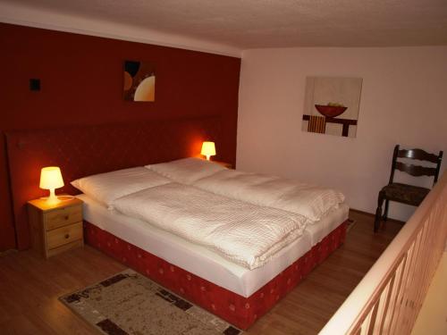 מיטה או מיטות בחדר ב-Hotel Liechtenstein Apartments II