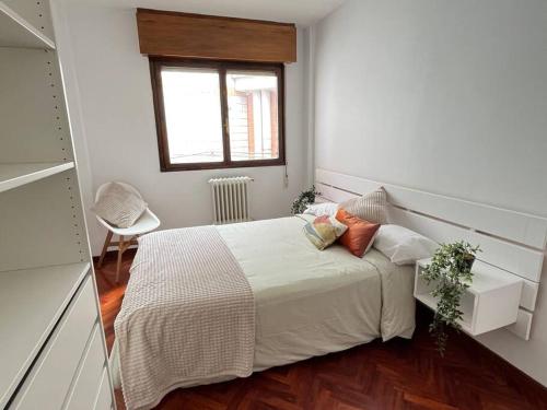 Postel nebo postele na pokoji v ubytování Apartamento El Fontán, parking gratuito