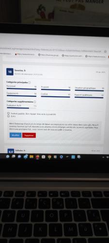 a laptop computer screen with a website on it at Gîte Des Huttes in Bain-de-Bretagne