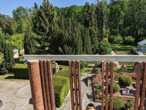 a view of a garden from the top of a building at La Closerie in Droue-sur-Drouette