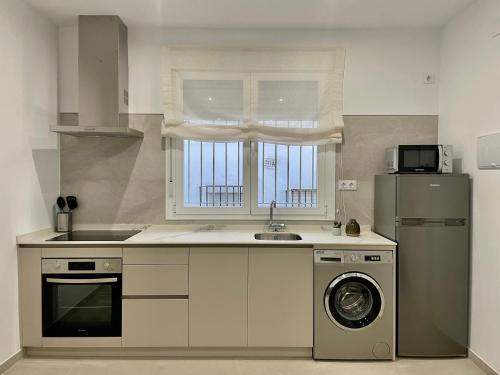 Kuchyň nebo kuchyňský kout v ubytování Apartamento Antonio