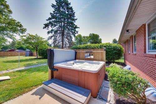 a hot tub in the backyard of a house at Marietta Home with Private Hot Tub, Pool Table! in Marietta