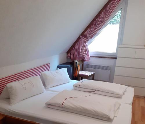 Postel nebo postele na pokoji v ubytování Appartement Hardenack