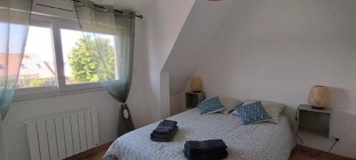Ένα ή περισσότερα κρεβάτια σε δωμάτιο στο Gite 2 Des Abbayes Du Val Seine
