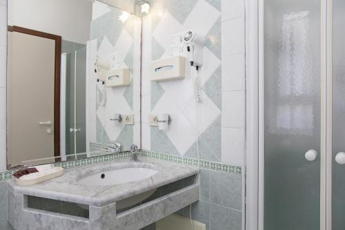 Koupelna v ubytování Hotel Elpiro