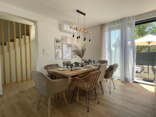 Φωτογραφία από το άλμπουμ του Boho Beach House Srima σε Srima