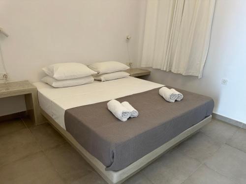 Ένα ή περισσότερα κρεβάτια σε δωμάτιο στο Niabelo Villa