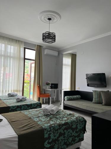 Postel nebo postele na pokoji v ubytování Guesthouse Data