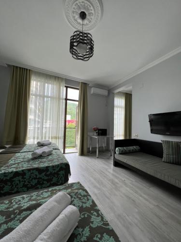 Postel nebo postele na pokoji v ubytování Guesthouse Data