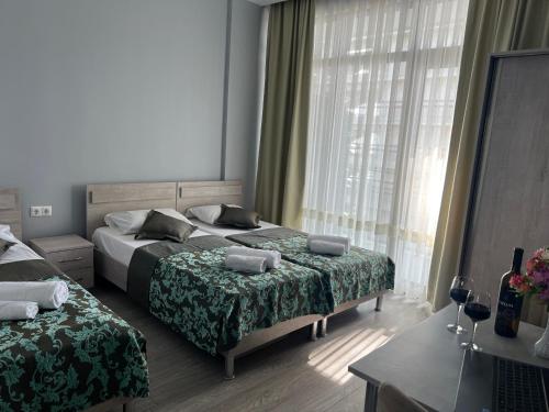 Postel nebo postele na pokoji v ubytování Guesthouse Data