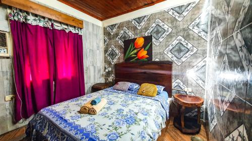 Una cama o camas en una habitación de El Paraiso Apart Hotel