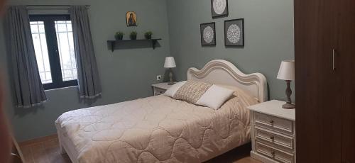 Postel nebo postele na pokoji v ubytování Cottage Meraki