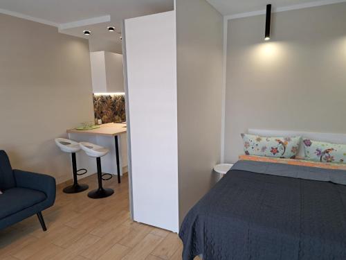 Ένα ή περισσότερα κρεβάτια σε δωμάτιο στο Apartament Rangia Świnoujście