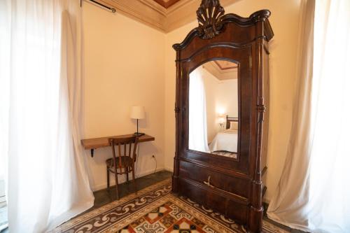 Una cama o camas en una habitación de Donna Elena