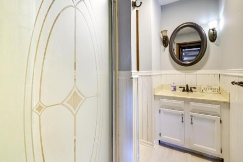 a bathroom with a shower and a sink and a mirror at Exciting Tobyhanna Home Near Kalahari Water Park! in Tobyhanna