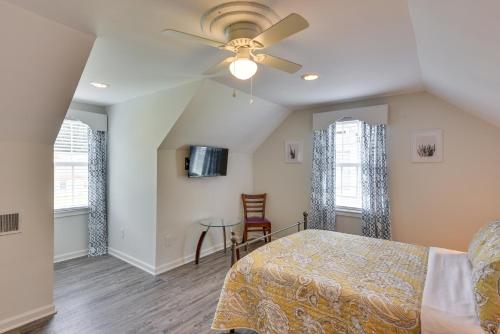 a bedroom with a bed and a ceiling fan at Charleston Vacation Rental with Yard! in Charleston