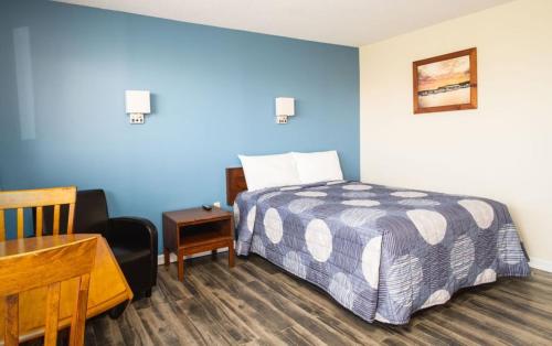 Postel nebo postele na pokoji v ubytování Hebridean Motel
