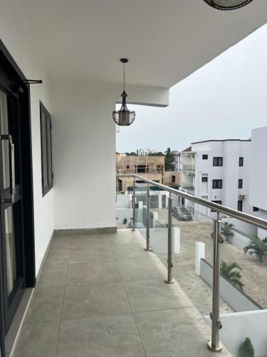 a view from the balcony of a white building at The FJORD at Martsmith in Accra