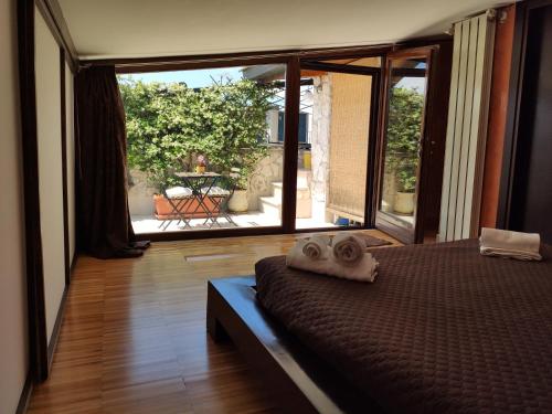 Postel nebo postele na pokoji v ubytování Vicolo degli Osci