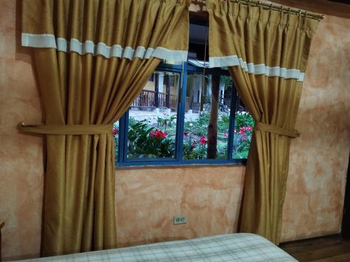 Postel nebo postele na pokoji v ubytování Hotel Achik Wasi