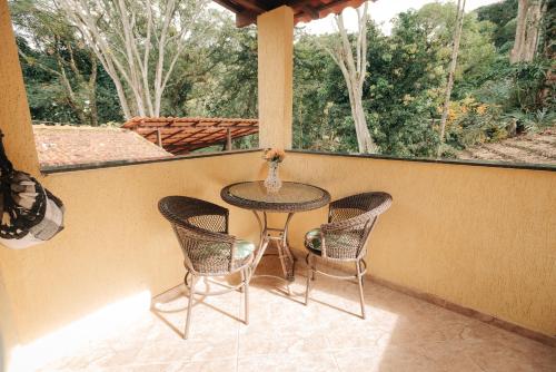 En balkong eller terrass på Chalé das Carpas