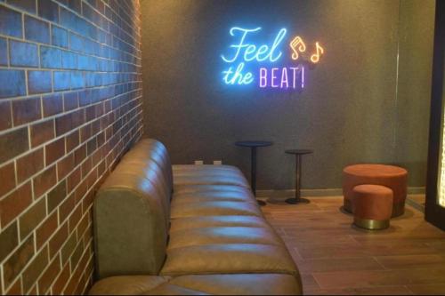 Khu vực ghế ngồi tại Apartamento em Resort