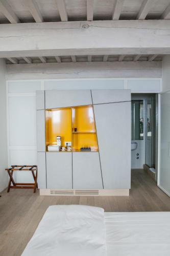 Postel nebo postele na pokoji v ubytování La Bandita Townhouse
