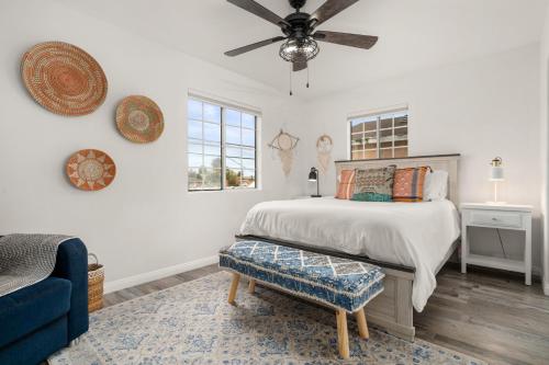 a bedroom with a bed and a ceiling fan at The Avalon - Pre Summer Sale! 25 Percent Off May! in Los Angeles