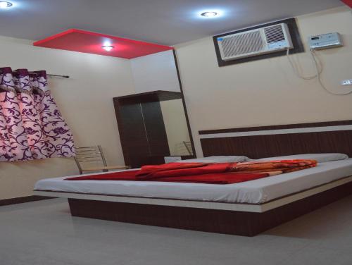 Posteľ alebo postele v izbe v ubytovaní Hotel Mittal Paradise