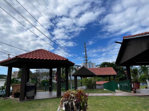 a group of gazebos in a park at Peaceful Luxury Villa - TheShine&GlowPlace in Fajardo