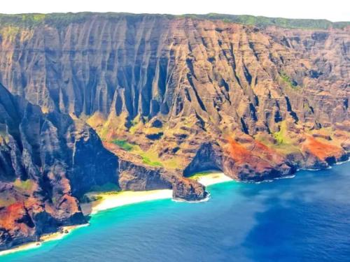 an aerial view of a beach in the grand canyon at Step to beach New Quiet Kiahuna Plantation Remodeled 2 bedroom condo with AC in Koloa