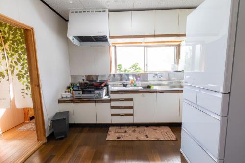Kuchyň nebo kuchyňský kout v ubytování Goto I-House