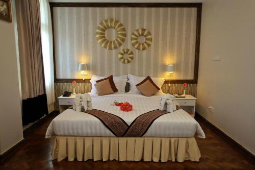 
Letto o letti in una camera di Mandalay City Hotel
