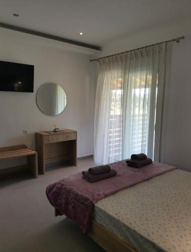 Postel nebo postele na pokoji v ubytování CASA QUERCU