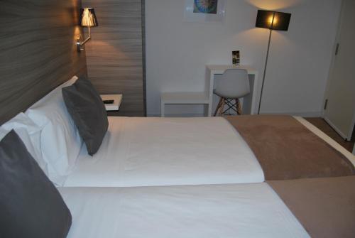 Katil atau katil-katil dalam bilik di Hotel BESTPRICE Gracia