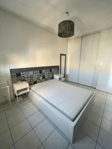 Posteľ alebo postele v izbe v ubytovaní Appartement T2 avec terrasse