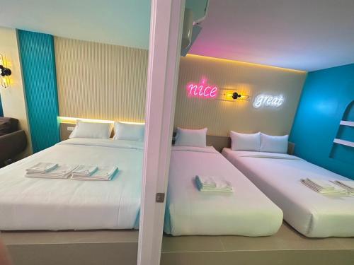Ascella Bangkok Hotelにあるベッド