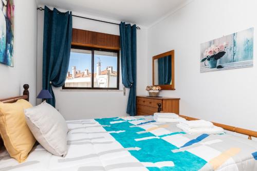 Ένα ή περισσότερα κρεβάτια σε δωμάτιο στο Apartamento Mantamar 9T1 by ALGARVEMANTA