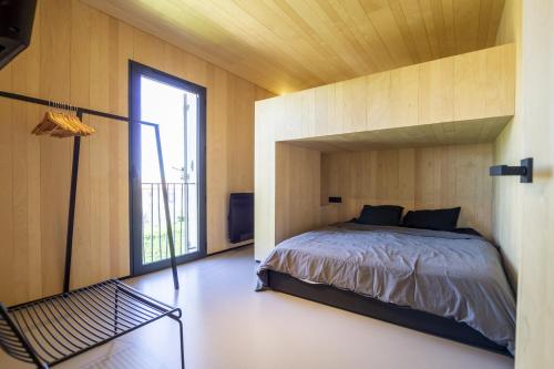 En eller flere senger på et rom på Villa la Provenca -Architectural House