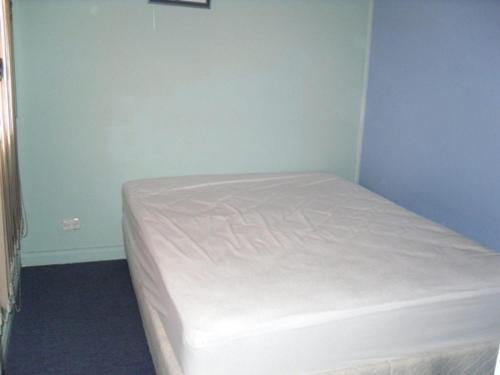 Una cama o camas en una habitación de Seachange